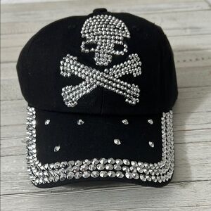 Black Cap with Skull and Crossbones Design